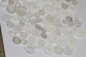 Preview: ca. 50 g Knöpfe aus Kunststoff weiß-transparent Mix verschiedene Größen und Formen