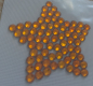 Preview: Swarovski-Bügelapplikation Stern gefüllt orange