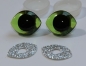 Preview: 1 Paar Sicherheitsaugen geschwungen transparent durchgefärbt grün mit Glitter 28 mm x 23 mm
