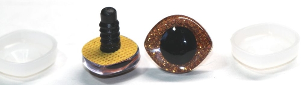 1 Paar Sicherheitsaugen geschwungen transparent durchgefärbt klar mit Glitter karamell 23 mm x 20 mm