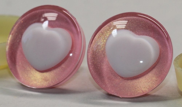 1 Paar Sicherheitsaugen trapezoid 25 mm rosegold metallic herzförmige Pupille weiß